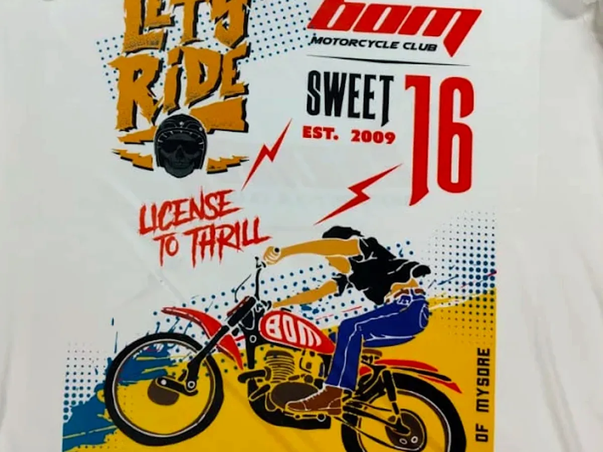 Close-up of the BOM Motorcycle Club DTF print artwork on a white polyester T-shirt