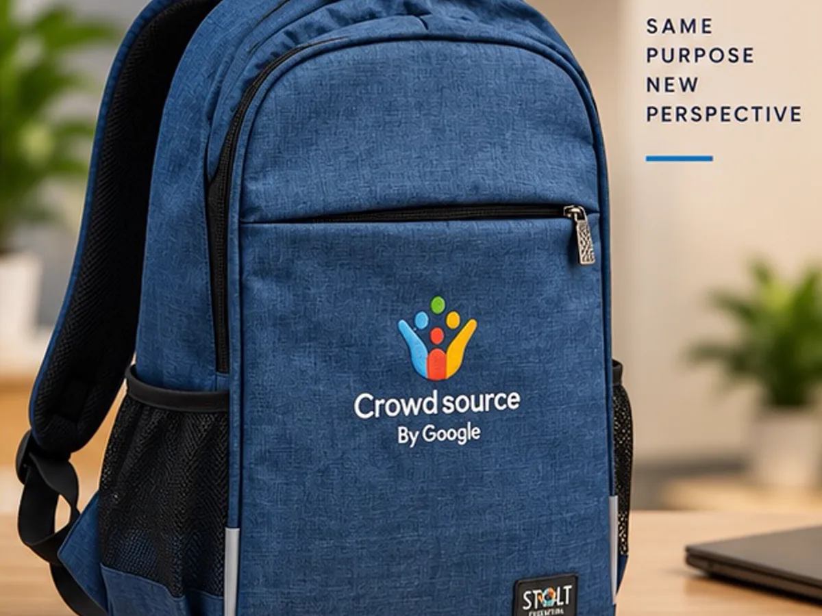 Angled view of the navy Crowdsource by Google embroidered backpack