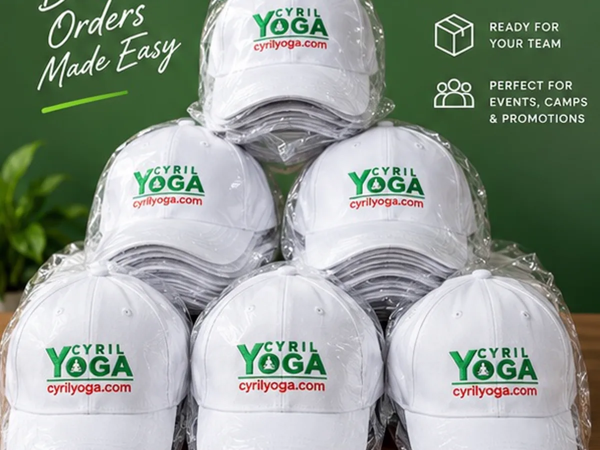 Individually packed Cyril Yoga branded white caps stacked for a bulk order