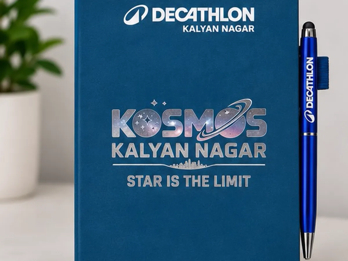 Blue Decathlon Kalyan Nagar printed diary with a matching branded pen