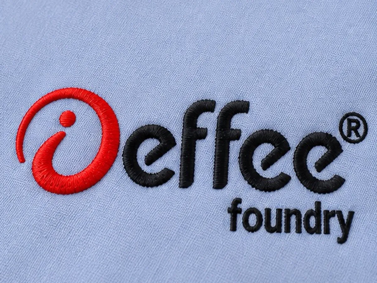 Close-up of the Effee Foundry logo embroidery stitching on shirt fabric