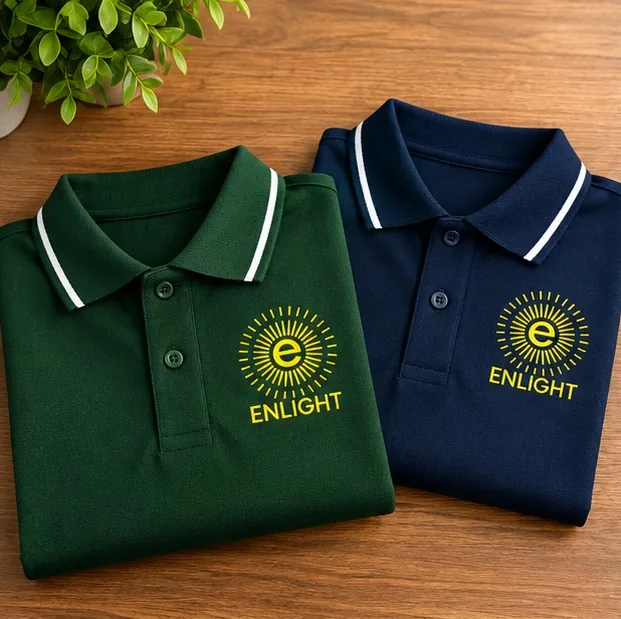 Folded green and navy blue Enlight cotton polo T-shirts with the yellow screen printed Enlight logo on the chest