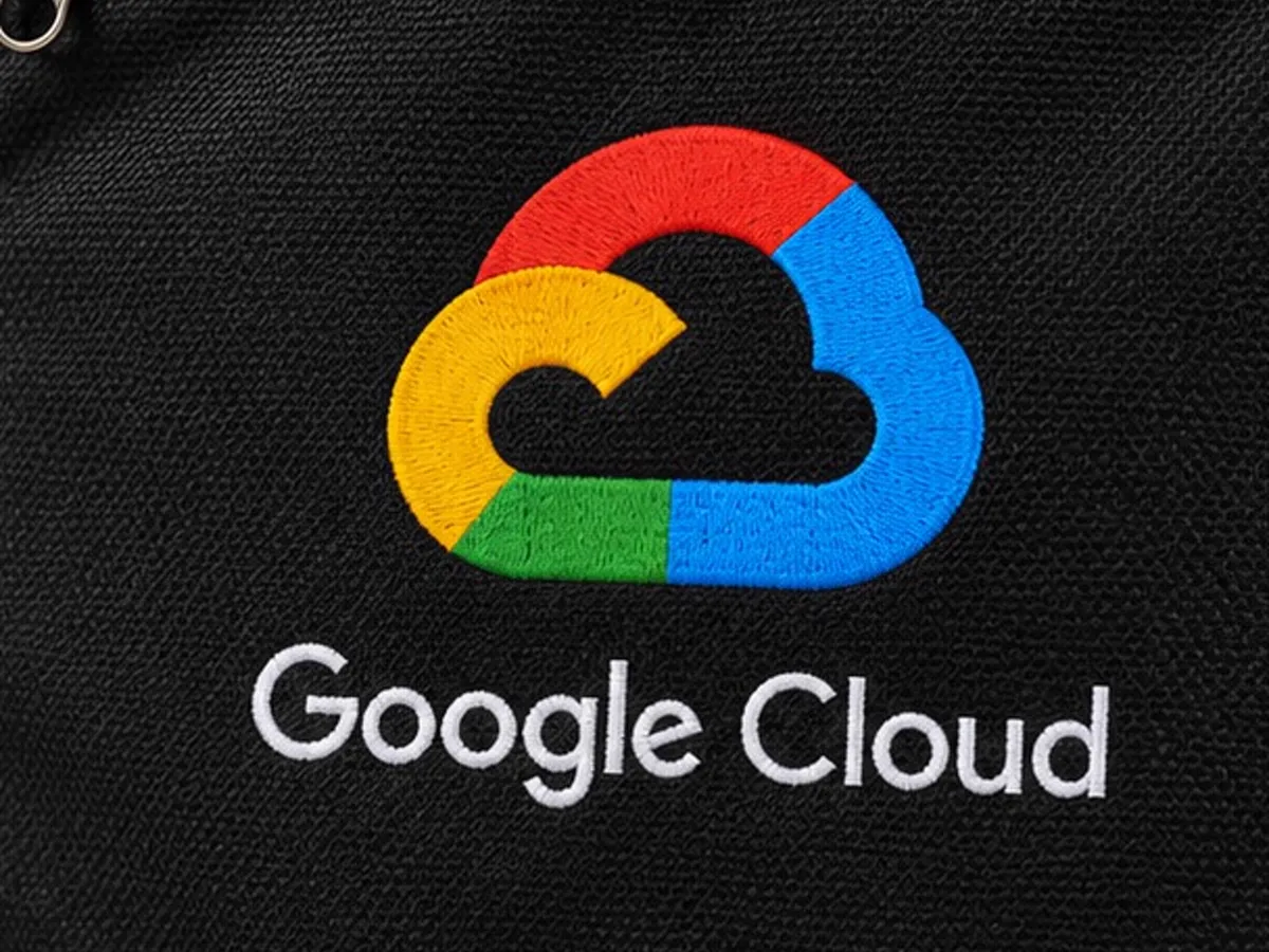 Close-up of the Google Cloud logo embroidery on the black sling bag fabric