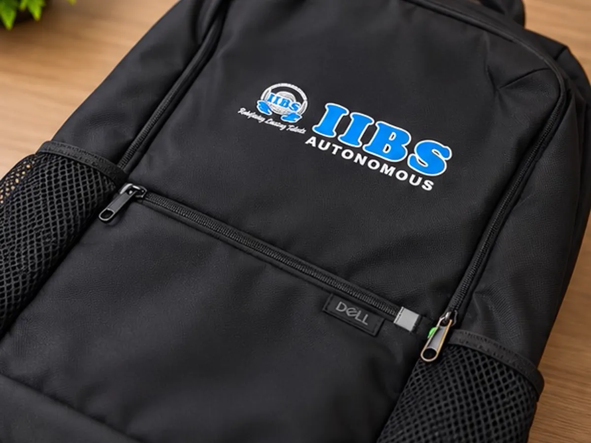 Close-up of the DTF printed IIBS Autonomous logo on the black backpack