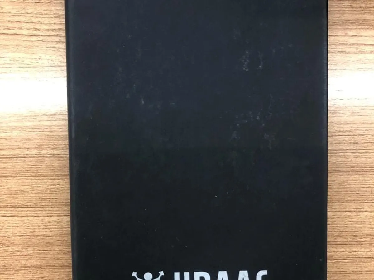Black Jiraaf diary with screen printed white logo on the cover
