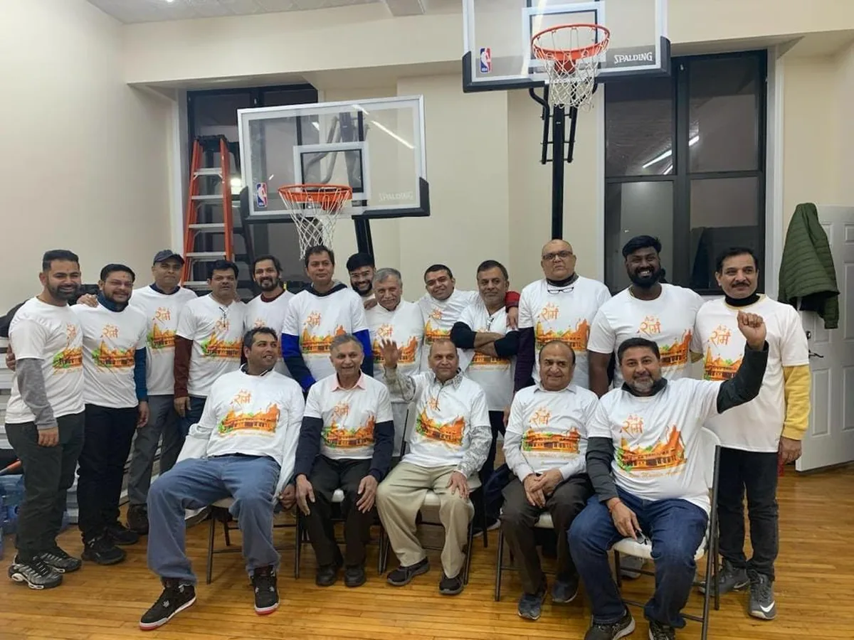 Group wearing white polyester T-shirts with full colour sublimation printed event artwork
