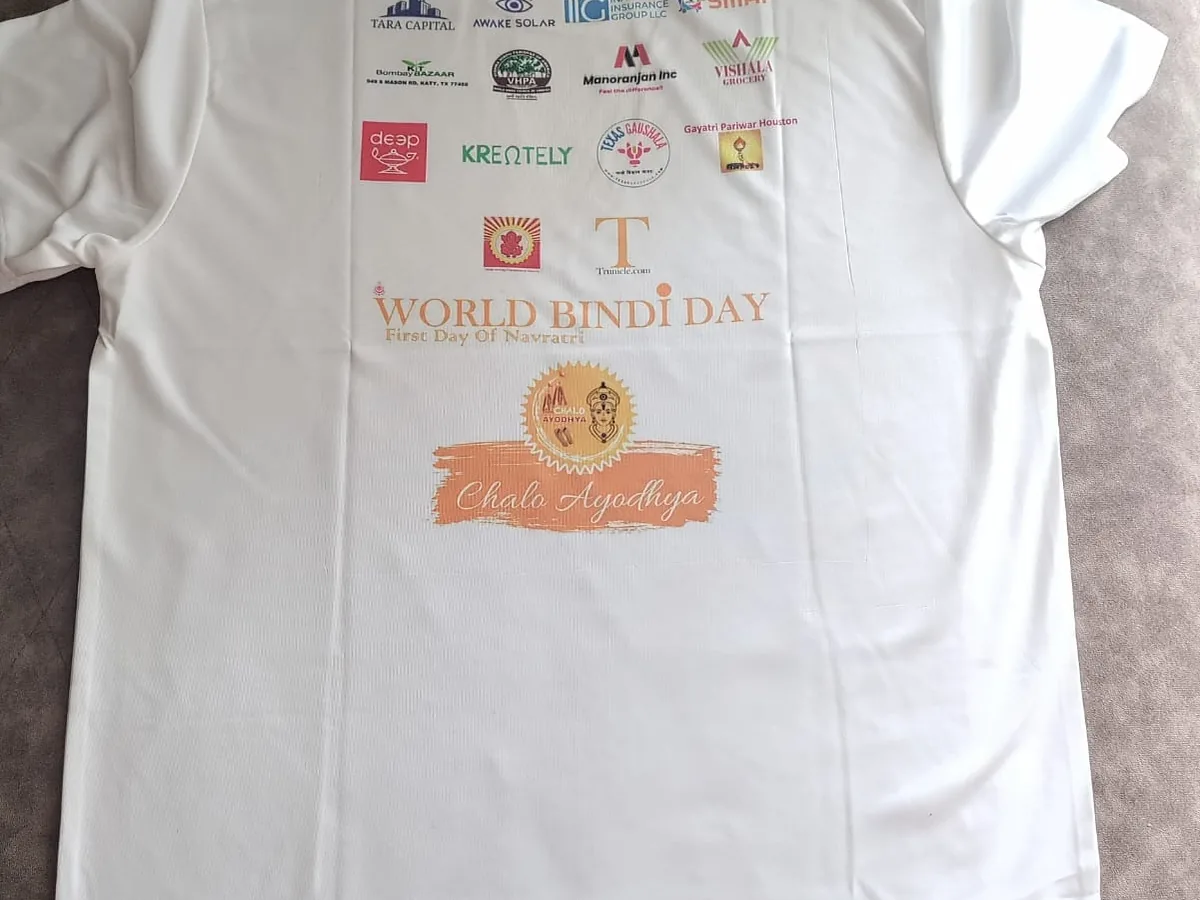 Back of the white polyester T-shirt showing sublimation printed sponsor logos and event artwork