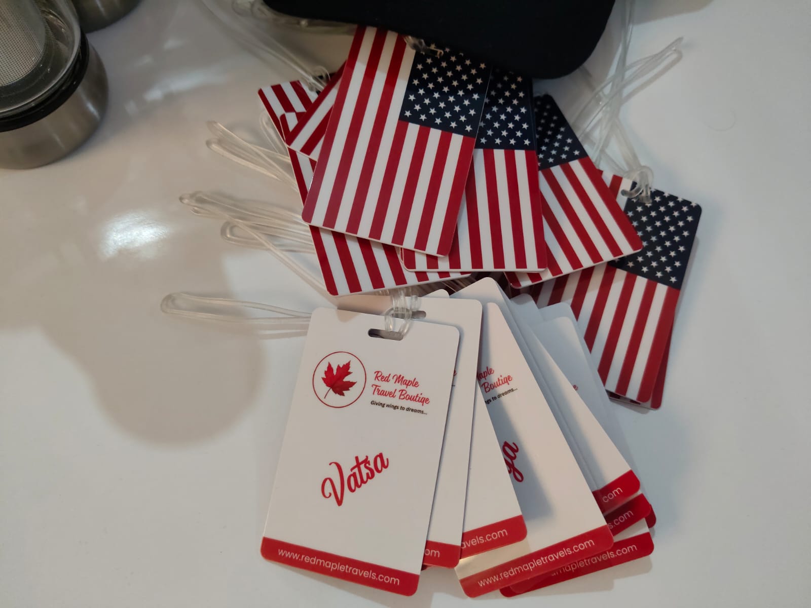 Red Maple Travel Boutique luggage tags with US flag backs and personalised name printing