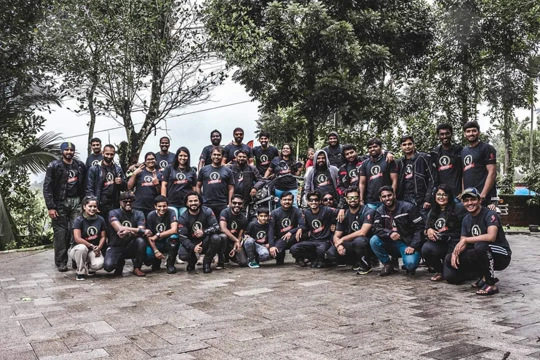 Large group of riders wearing the Sri Sadguru Sai Motors printed T-shirts