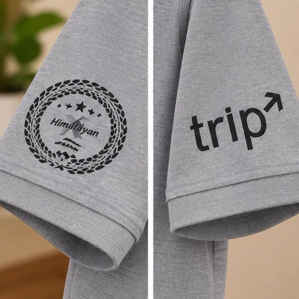 Sleeve prints on the SSS Motors polo showing the Himalayan badge and trip logo